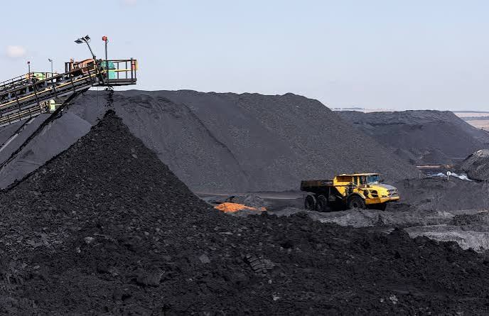 Coal mining operation with haul trucks